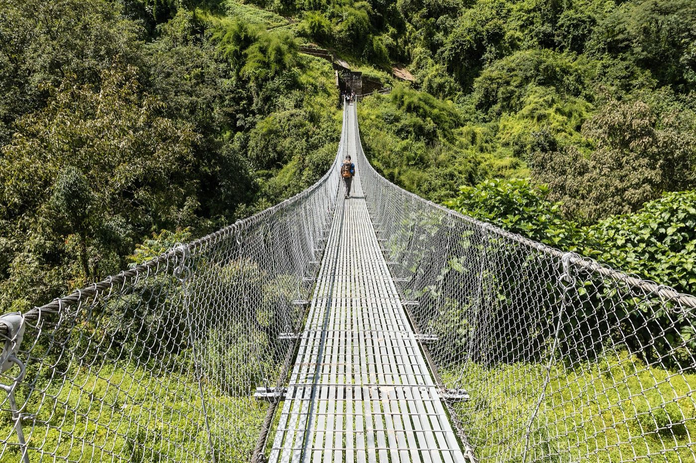A suspension bridge in Nepal. Photo: Bijay Chaurasia, CC BY-SA 4.0